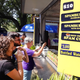 People visit a food booth specializing in Spam products.